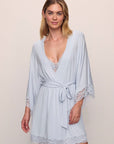 Model wears Mariana TENCEL™ Modal Robe in Ice Blue.