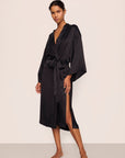 Model is wearing Inez Washable Silk Long Robe in Black