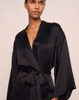 Model is wearing Inez Washable Silk Long Robe in Black