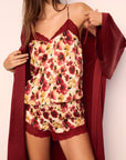 Model is wearing Washable Silk Printed Cami and Short Set and Long Robe in Botanical Flower Merlot and Merlot