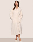 Model is wearing Renew plush Robe in Ivory