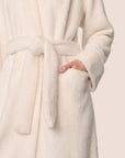 Model is wearing Renew plush Robe in Ivory