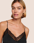 Model is wearing Washable Silk Lace Slip in Black/Black