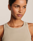 Model is wearing Essential Rib Tank in Beige