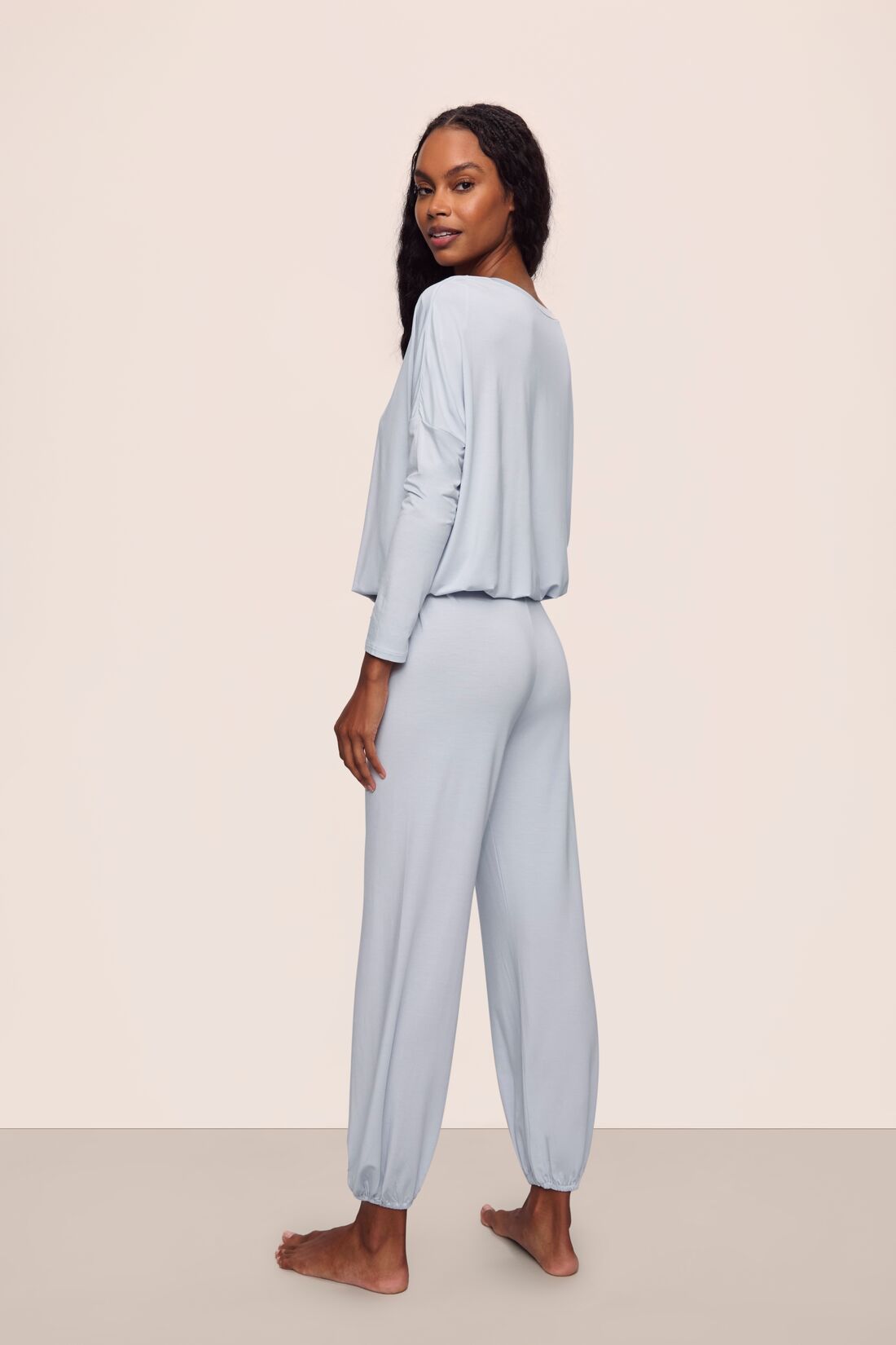 Model is wearing Gisele TENCEL™ Modal Slouchy PJ Set in Ice Blue/Ice Blue