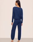 Model is wearing Gisele TENCEL™ Modal Slouchy PJ Set in Navy/Ivory