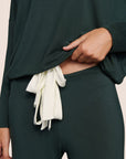 Model is wearing Gisele TENCEL™ Modal Slouchy PJ Set in Pine/Ivory