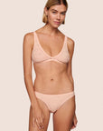 Model is wearing Soft Stretch Lace Bikini in Buff