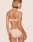 Model is wearing Soft Stretch Lace Bikini in Buff