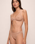 Model is wearing Soft Stretch Recycled Lace High Leg Brief in Sunkissed