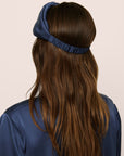 Model Is Wearing Inez Pillow Eye Mask In Navy