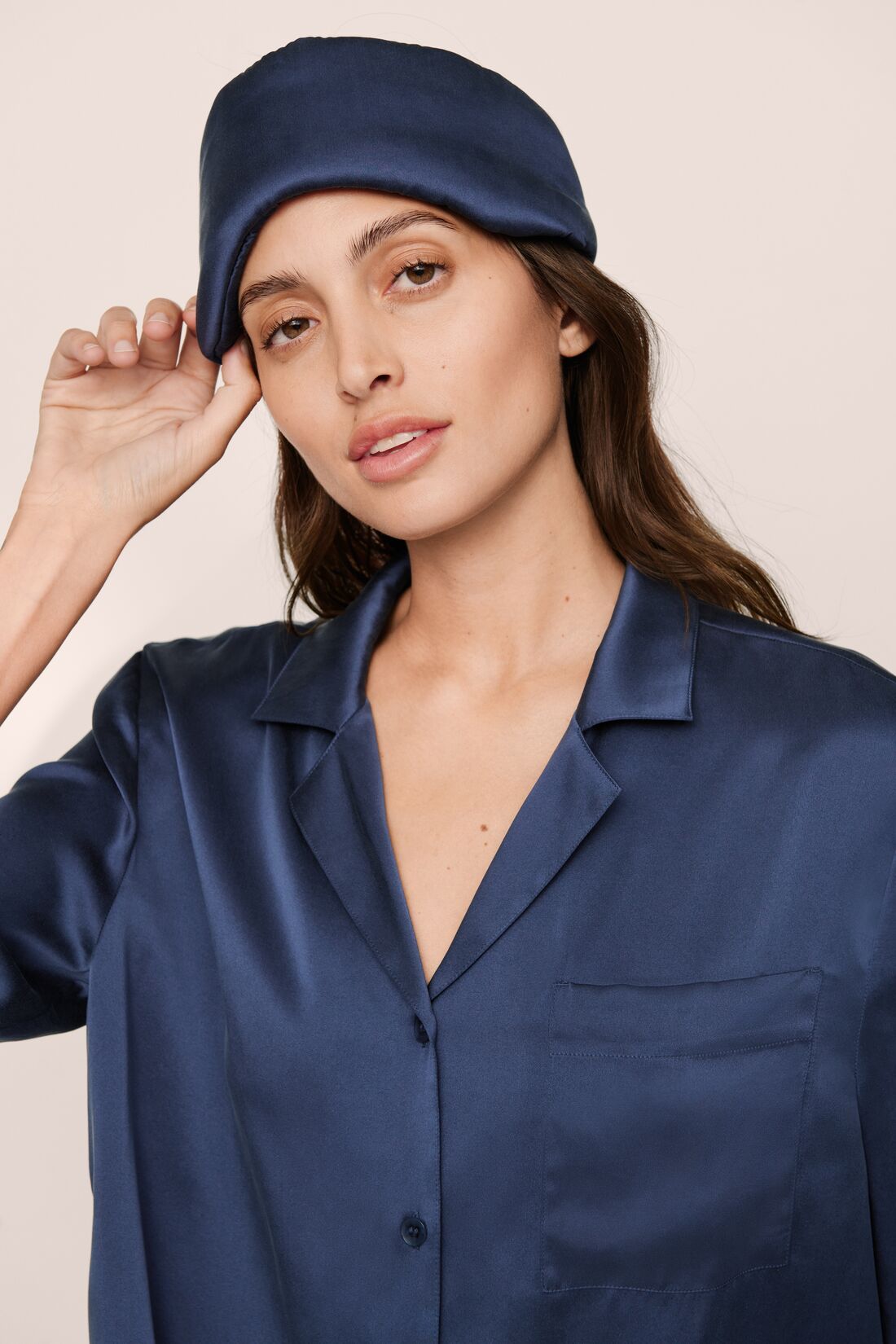 Model Is Wearing Inez Pillow Eye Mask In Navy