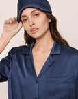 Model Is Wearing Inez Pillow Eye Mask In Navy
