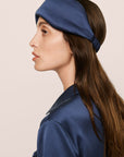 Model Is Wearing Inez Pillow Eye Mask In Navy