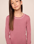 Model is wearing Kids TENCEL™ Modal Unisex Long PJ Set in Berry Blush/Ivory
