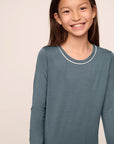 Model is wearing Kids TENCEL™ Modal Unisex Long PJ Set in Stone Blue/Ivory