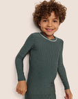 Model is wearing Kids Printed TENCEL™ Modal Unisex Long PJ Set in Duo Stripe Pine/Ivory
