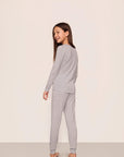 Model is wearing Kids Printed TENCEL™ Modal Unisex Long PJ Set in Geo