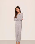 Model is wearing Kids Printed TENCEL™ Modal Unisex Long PJ Set in Geo