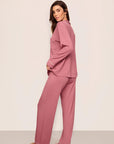 Model is wearing Gisele TENCEL™ Modal Long PJ Set in Berry Blush/Ivory