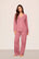Model is wearing Gisele TENCEL™ Modal Long PJ Set  in  Berry Blush/Ivory