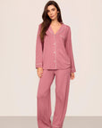 Model is wearing Gisele TENCEL™ Modal Long PJ Set in Berry Blush/Ivory