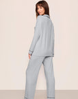Model is wearing Gisele TENCEL™ Modal Long PJ Set in Gray Dawn/Navy