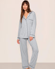 Model is wearing Gisele TENCEL™ Modal Long PJ Set in Gray Dawn/Navy