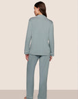 Model is wearing Gisele TENCEL™ Modal Long PJ Set in Lead/Ivory