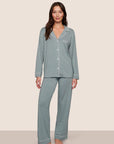 Model is wearing Gisele TENCEL™ Modal Long PJ Set in Lead/Ivory