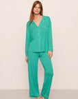 Model is wearing Gisele TENCEL™ Modal Long PJ Set in Oasis Green/White