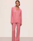 Model is wearing Gisele TENCEL™ Modal Long PJ Set in Sunkissed Coral/Ivory