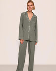 Model is wearing Gisele TENCEL™ Modal Long PJ Set in Smokey Olive/Ivory