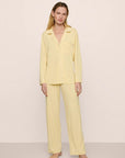 Model is wearing Gisele TENCEL™ Modal Long PJ Set in Sunrise/Ivory