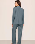 Model is wearing Gisele TENCEL™ Modal Long PJ Set in Stone Blue/Ivory