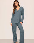 Model is wearing Gisele TENCEL™ Modal Long PJ Set in Stone Blue/Ivory