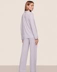 Model is wearing Gisele TENCEL™ Modal Long PJ Set in Thistle/Ivory