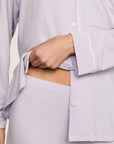 Model is wearing Gisele TENCEL™ Modal Long PJ Set in Thistle/Ivory