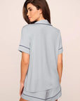 Model is wearing Gisele TENCEL™ Modal Relaxed Short PJ Set in Gray Dawn/Navy