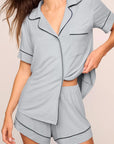 Model is wearing Gisele TENCEL™ Modal Relaxed Short PJ Set in Gray Dawn/Navy