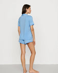 Model is wearing Gisele TENCEL™ Modal Shortie Short PJ Set in Summer Blue/White