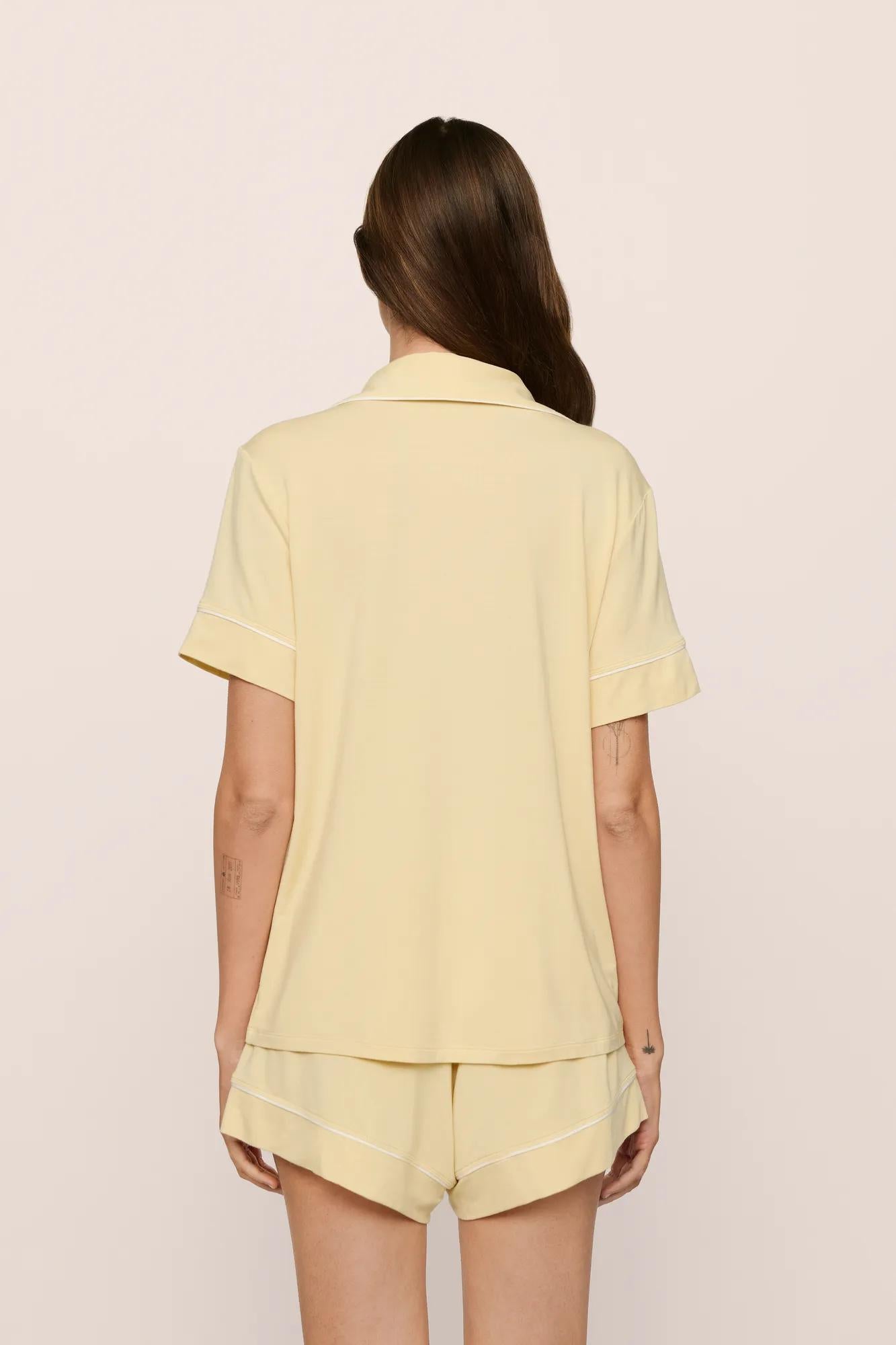 Model is wearing Gisele TENCEL™ Modal Relaxed Short PJ Set in  Sunrise/Ivory