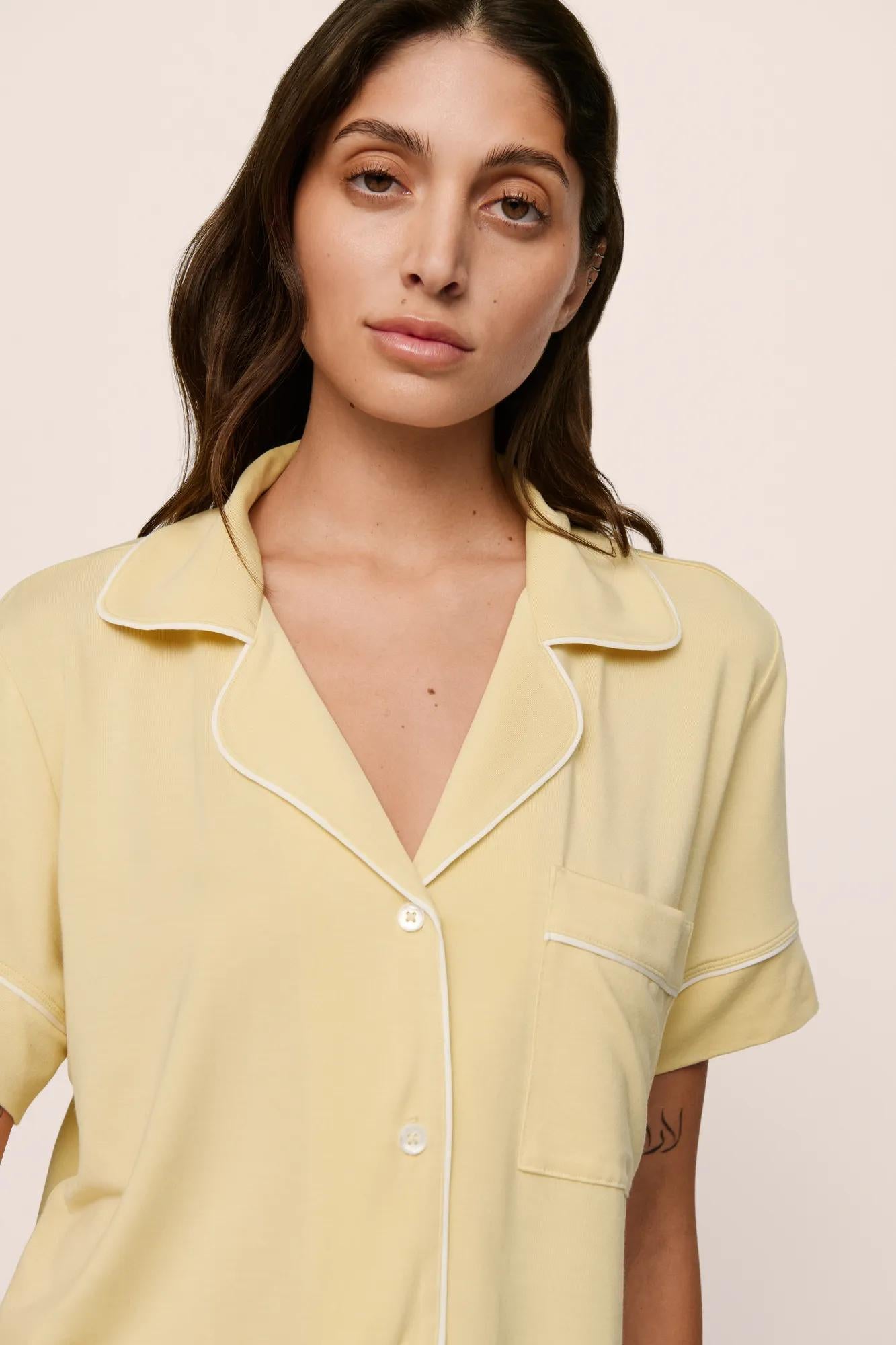 Model is wearing Gisele TENCEL™ Modal Relaxed Short PJ Set in  Sunrise/Ivory