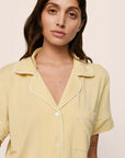 Model is wearing Gisele TENCEL™ Modal Relaxed Short PJ Set in Sunrise/Ivory