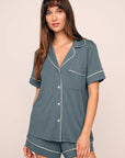 Model is wearing Gisele TENCEL™ Modal Relaxed Short PJ Set in Stone Blue/Ivory