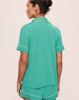 Model is wearing Gisele TENCEL™ Modal Relaxed Short PJ Set in Oasis Green/White