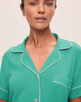Model is wearing Gisele TENCEL™ Modal Relaxed Short PJ Set in Oasis Green/White