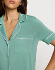 Model is wearing Gisele TENCEL™ Modal Short Sleeve & Pant PJ Set in Seagrass/White