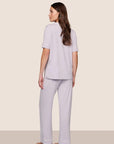 Model is wearing Gisele TENCEL™ Modal Short Sleeve & Pant PJ Set in Thistle/Ivory