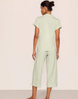 Model is wearing Gisele TENCEL™ Modal Short Sleeve Cropped PJ Set in Mint Cream/Ivory